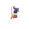 Colourful French macaron charms attached to Eiffel Tower keyring