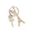 Gold-Eiffel-Tower-Keychain-with-Rose-flower-Charm-Roneljake