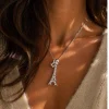 Silver-eiffel-tower-necklace-with-butterfly-charm-souvenir-jewelry-roneljake
