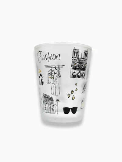Clear glass 2oz shooter with French typography design used as a trendy travel keepsake gift