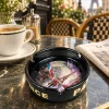 Paris souvenir ashtray with Eiffel Tower Sacré-Cœur and rainy street scene
